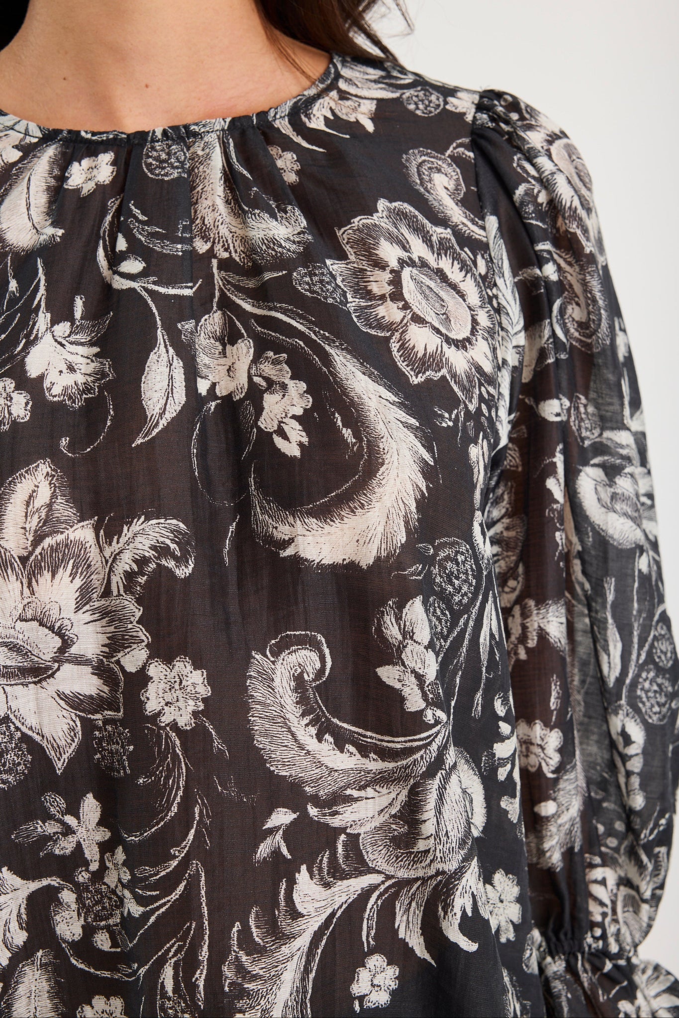 Briefly black scrolling foliage frill sleeve crew neck top