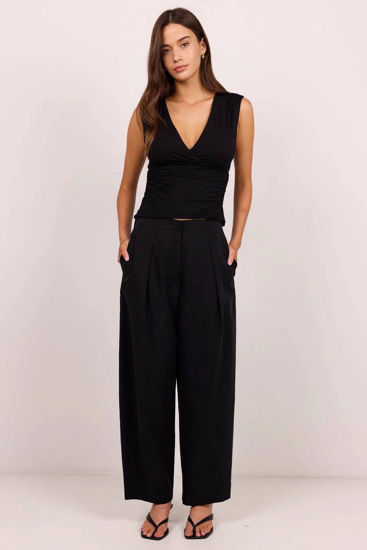 Manifesto black front pleat barrel leg pants