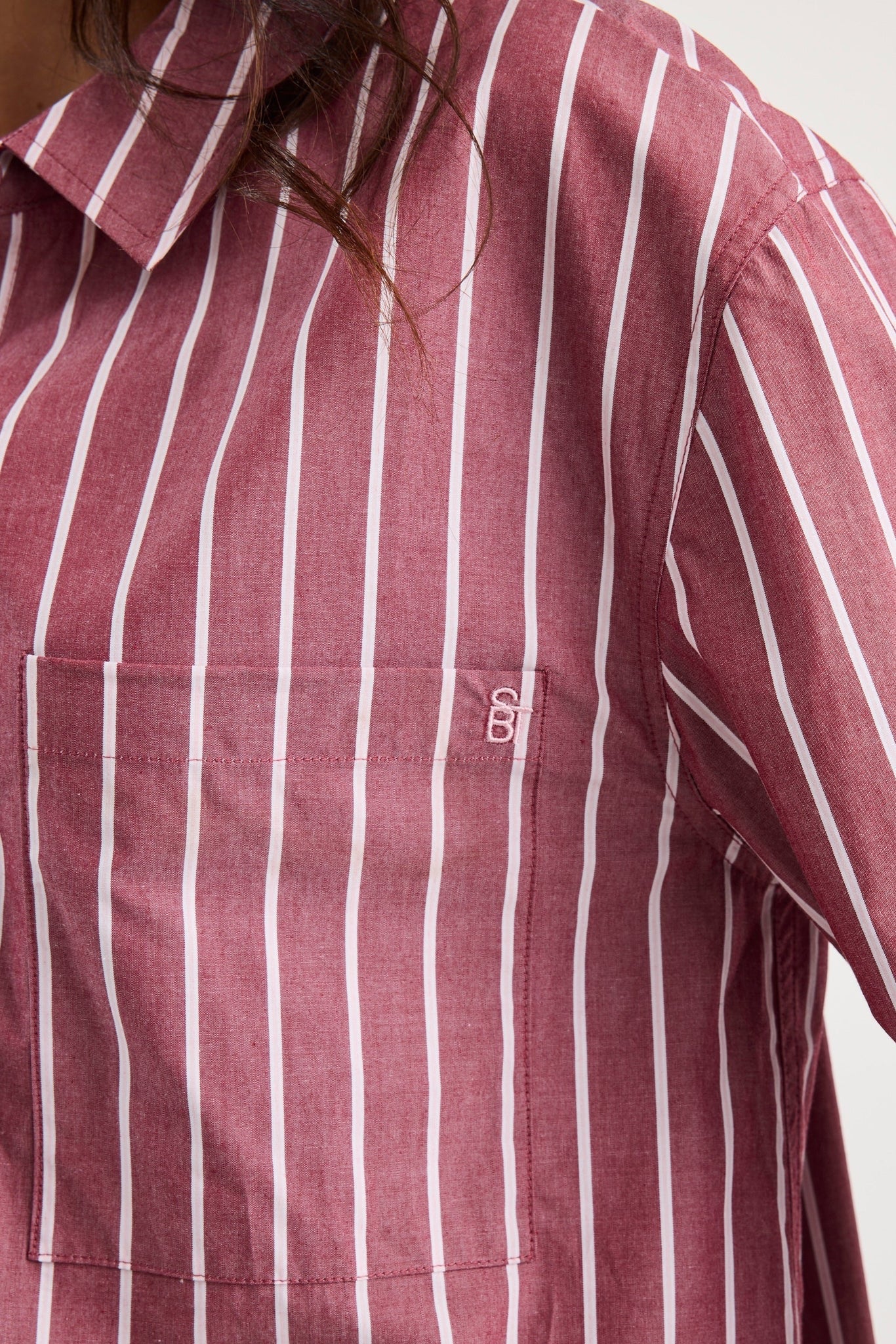 You got this burgundy stripe b/f shirt