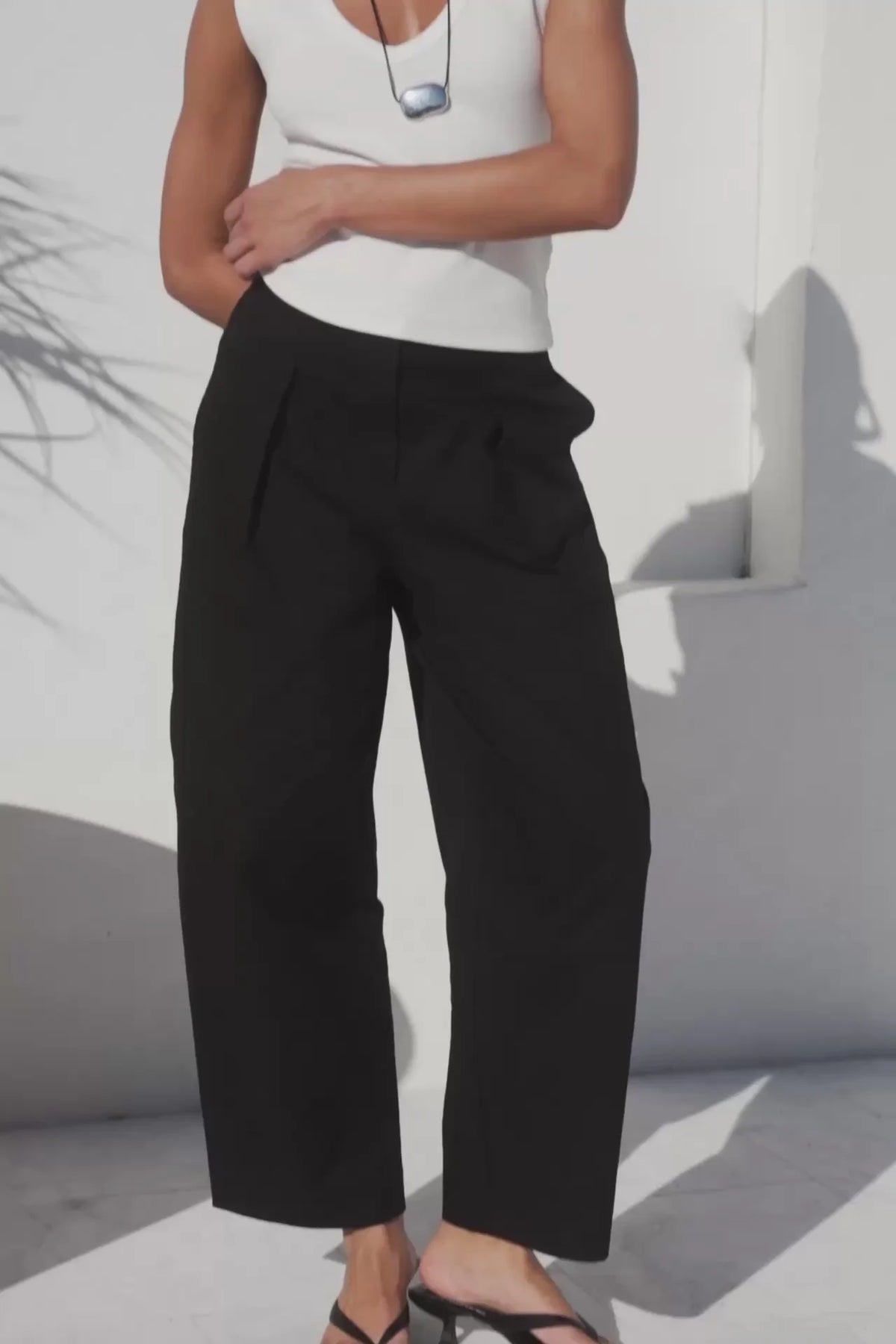 Manifesto black front pleat barrel leg pants